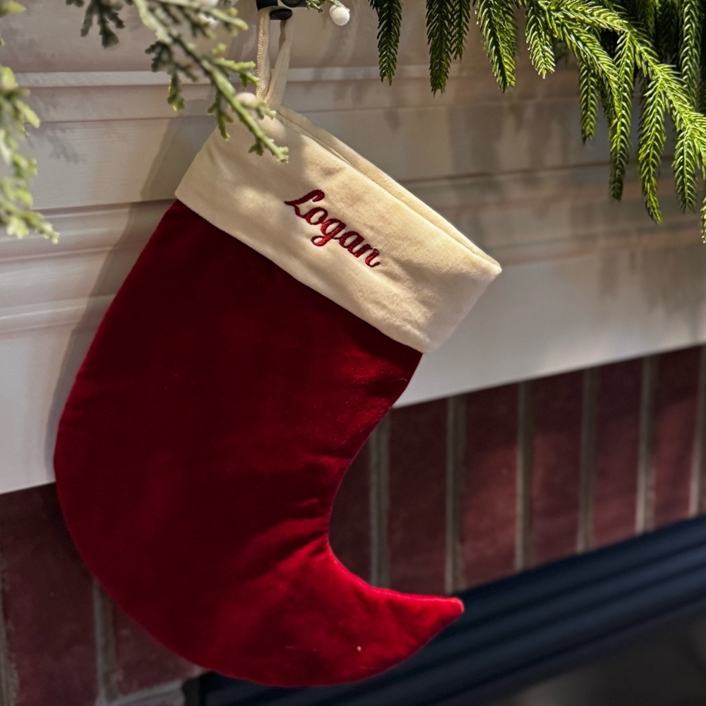 Pottery Barn Red and Cream Holiday Stocking. LOGAN
